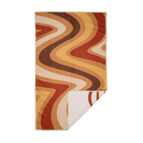 Tea towel with curved geometric lines, in fall colors of beige, caramel, burnt sienna, Choclate.